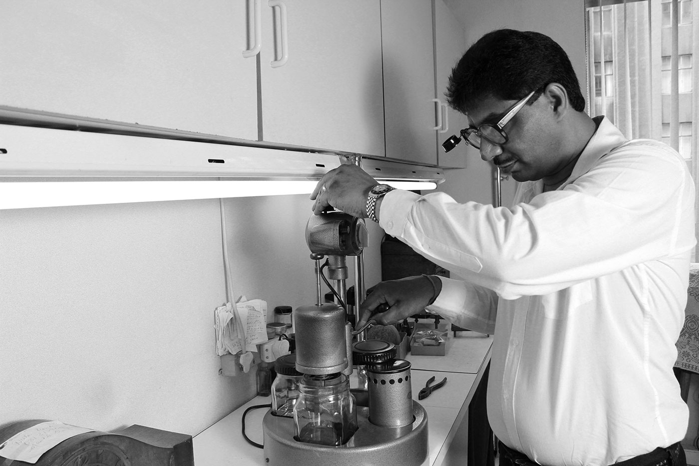 Devan Moodley working on clock