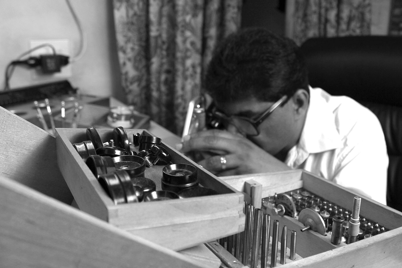 Devan Moodley working on clock